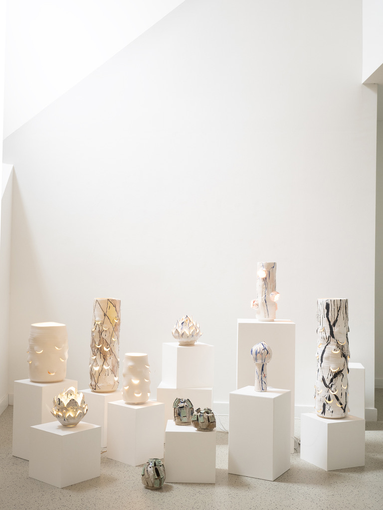 Installation view of the Emergence exhibition with ceramic light sculptures by Nathalie Hunter